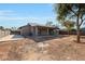 Large backyard with covered patio and ample space for outdoor activities at 7818 W Encinas Ln, Phoenix, AZ 85043