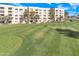 Landscaped putting green adjacent to building at 7910 E Camelback Rd # 312, Scottsdale, AZ 85251