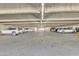 Underground parking garage with various cars parked at 7910 E Camelback Rd # 312, Scottsdale, AZ 85251