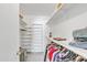 Large walk-in closet with ample shelving and hanging space at 7910 E Camelback Rd # 312, Scottsdale, AZ 85251