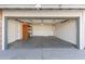 Spacious garage with shelving and extra storage at 7915 W Wethersfield Rd, Peoria, AZ 85381