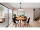 Dining area with sliding glass doors and a chandelier at 8039 N 48Th Ave, Glendale, AZ 85302