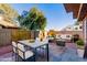 Relaxing patio with seating area, perfect for outdoor dining and entertaining at 8039 N 48Th Ave, Glendale, AZ 85302