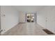 Bright living room with large window, neutral walls, and tile flooring at 811 W Whitton Ave, Phoenix, AZ 85013