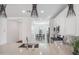 Modern kitchen with white cabinets and a breakfast nook at 8908 W Bethany Heights Dr, Glendale, AZ 85305