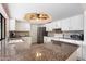 Modern kitchen featuring granite countertops and stainless steel appliances at 9041 E Ludlow Dr, Scottsdale, AZ 85260