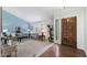 Cozy living room featuring a light blue accent wall and wood floors at 9041 E Ludlow Dr, Scottsdale, AZ 85260