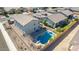 Aerial view featuring a backyard pool, fenced yard, and the back of a two-story home at 9144 W Sands Dr, Peoria, AZ 85383