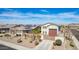 Attractive single-Gathering home with desert landscaping, attached garage, and a gated driveway at 9144 W Sands Dr, Peoria, AZ 85383