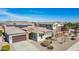 Beautiful single-Gathering home with desert landscaping, attached garage, and covered porch at 9144 W Sands Dr, Peoria, AZ 85383