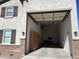 Garage with overhead storage and workbench at 9144 W Sands Dr, Peoria, AZ 85383