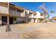 View of multiple tan townhomes, showing building exterior at 944 S Valencia -- # 3, Mesa, AZ 85202