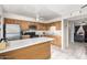 Kitchen with stainless steel appliances and wood cabinets at 944 S Valencia -- # 3, Mesa, AZ 85202