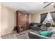 Living room with gray couches and wood entertainment center at 944 S Valencia -- # 3, Mesa, AZ 85202