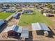 Aerial view of property with barn, paddocks, and horses at 9449 S 156Th Pl, Gilbert, AZ 85234