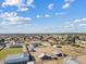 Aerial view of the property, showing the house, pool, and surrounding land at 9449 S 156Th Pl, Gilbert, AZ 85234