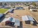 Aerial view of property with barn, paddocks, and horses at 9449 S 156Th Pl, Gilbert, AZ 85234