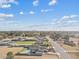 Aerial view of a home with a pool and large lot, showcasing its rural setting at 9449 S 156Th Pl, Gilbert, AZ 85234