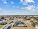 Aerial view of a house with pool and stables at 9449 S 156Th Pl, Gilbert, AZ 85234