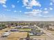 Aerial view of a beautiful property with a large house and a pool at 9449 S 156Th Pl, Gilbert, AZ 85234