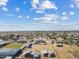 Aerial view of a property with a house, barn, and expansive grounds at 9449 S 156Th Pl, Gilbert, AZ 85234