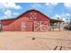 Red barn with white accents and large double doors at 9449 S 156Th Pl, Gilbert, AZ 85234