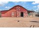 Red barn with white accents and large double doors at 9449 S 156Th Pl, Gilbert, AZ 85234