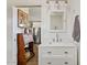 Bright bathroom with white vanity and modern fixtures at 9449 S 156Th Pl, Gilbert, AZ 85234