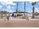 Exterior view of a stunning mid-century modern home with unique architectural details at 9449 S 156Th Pl, Gilbert, AZ 85234