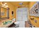 Charming bathroom with green sink and shower stall at 9533 W Cedar Hill N Cir, Sun City, AZ 85351