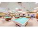 Well-lit billiards room offering many pool tables at 1000 Leisure World --, Mesa, AZ 85206