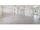 Bright living room with tile floors and access to other rooms at 1000 Leisure World --, Mesa, AZ 85206