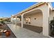 Covered patio with tile flooring and access to backyard at 1000 Leisure World --, Mesa, AZ 85206