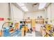 Well-equipped wood shop with various tools and workbenches at 1000 Leisure World --, Mesa, AZ 85206