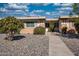 Ranch home exterior with walkway and landscaping at 10114 W Campana Dr, Sun City, AZ 85351