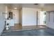 Clean garage with washer, dryer, and extra storage at 10114 W Campana Dr, Sun City, AZ 85351