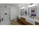 Bathroom with double vanity, large shower, and modern fixtures at 10137 N White Rd, Maricopa, AZ 85139