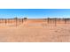 Horse corrals with metal fencing and riding area at 10137 N White Rd, Maricopa, AZ 85139