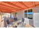 Covered patio with table and chairs offering a view of the surrounding landscape at 10137 N White Rd, Maricopa, AZ 85139