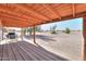 View from covered patio showcasing the backyard and surrounding landscape at 10137 N White Rd, Maricopa, AZ 85139