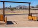 View of the property entrance with mountains in the background at 10137 N White Rd, Maricopa, AZ 85139