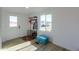 Inviting entryway with coat rack and storage bench at 10137 N White Rd, Maricopa, AZ 85139