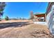 Covered patio and single story home at 10137 N White Rd, Maricopa, AZ 85139