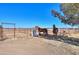 Spacious horse corral with sturdy metal fencing, providing a safe and secure area for horses at 10137 N White Rd, Maricopa, AZ 85139