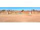 Horse corral with metal fencing, dirt ground, and multiple horses visible at 10137 N White Rd, Maricopa, AZ 85139