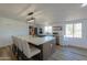 Modern kitchen with large island and stainless steel appliances at 10137 N White Rd, Maricopa, AZ 85139