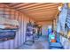 Organized tack room in a shipping container, with shelves and storage for saddles and riding equipment at 10137 N White Rd, Maricopa, AZ 85139