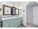 Double vanity bathroom with a view to another room at 10606 E Hercules Dr, Sun Lakes, AZ 85248