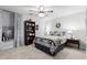 Bedroom with window seat, bookshelf and ceiling fan at 10606 E Hercules Dr, Sun Lakes, AZ 85248