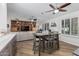 Casual dining area with table and chairs, open to the living room at 10606 E Hercules Dr, Sun Lakes, AZ 85248